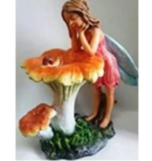 Фигура Девушка с крылышками около лисичек Н-65см F1212 в интернет гипермаркете «Планета Лета». Фото