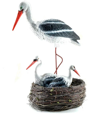 Комплект аистов в гнезде в интернет гипермаркете «Планета Лета». Фото